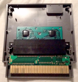 Rare 5-screw cases sometimes contain Famicom converters. Image: jinjabobot